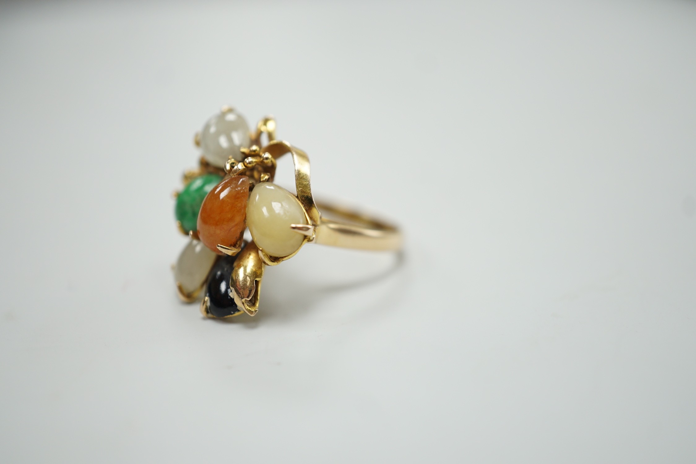 A modern 585 yellow metal and multi coloured cabochon jadeite cluster set dress ring, size N